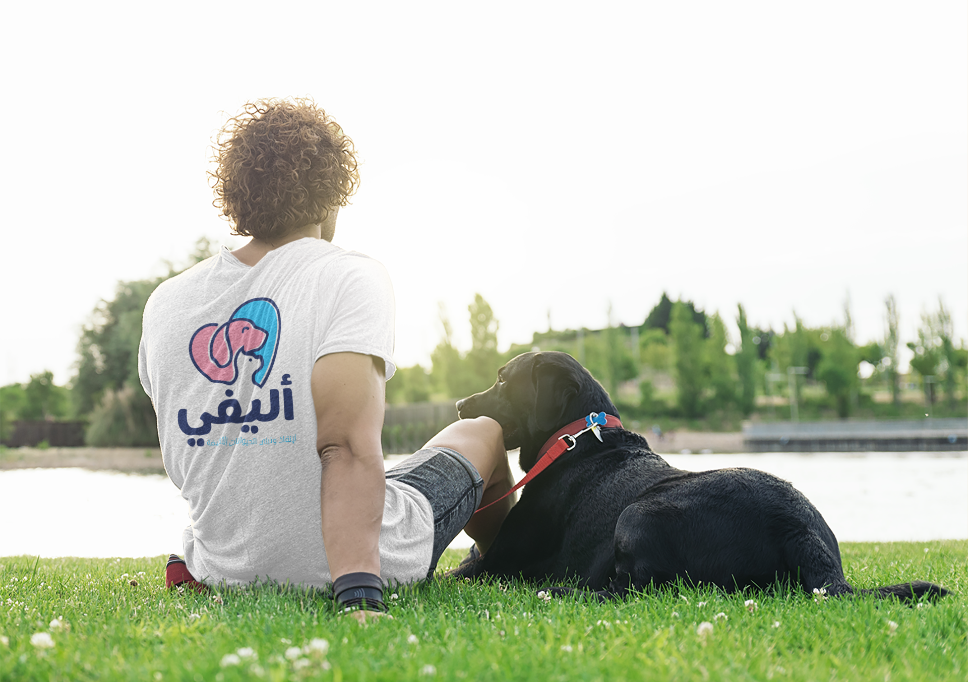 back-view-t-shirt-mockup-of-a-man-chilling-with-his-dog-39428-r-el2