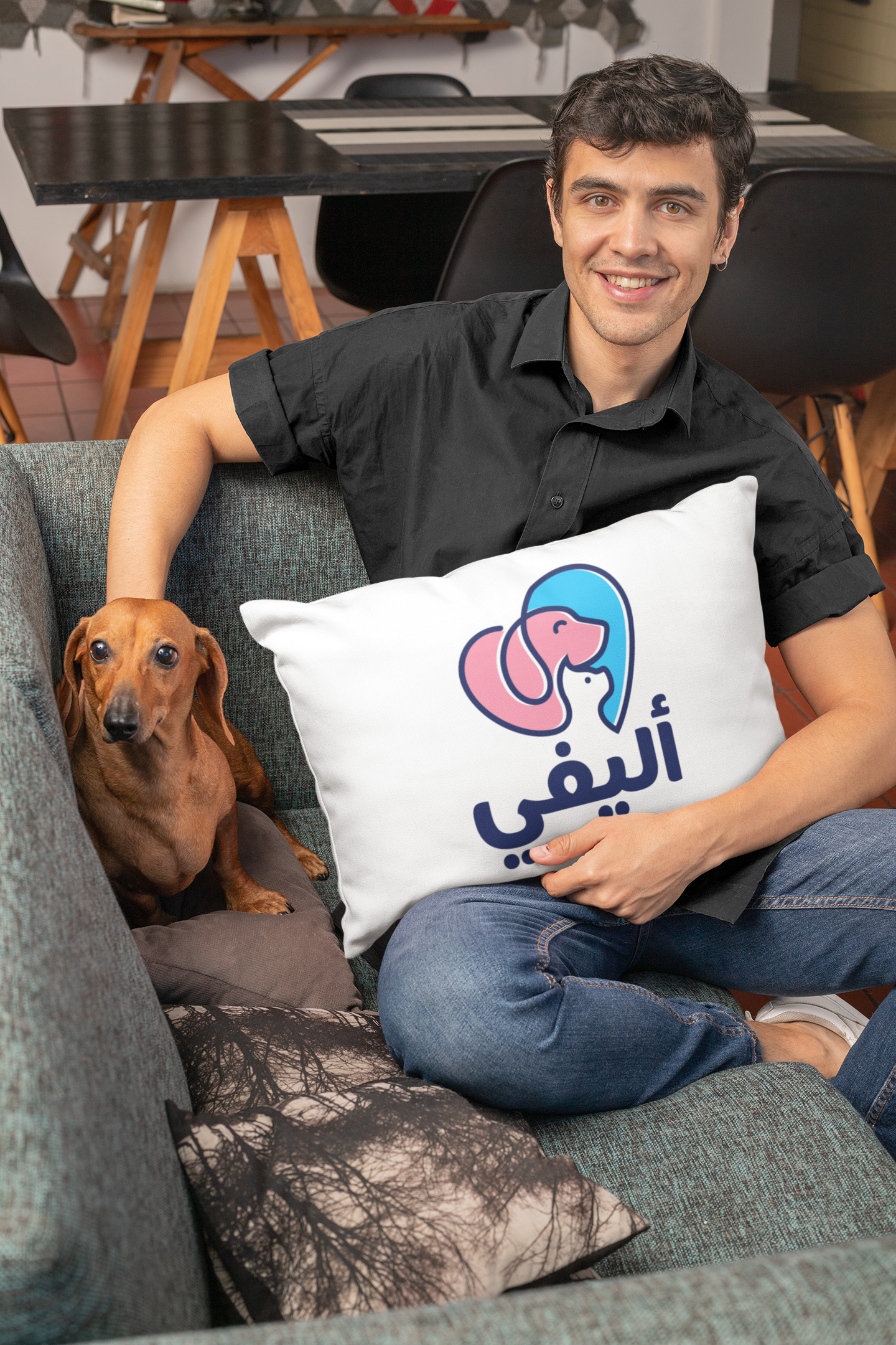 mockup-of-a-man-holding-a-pillow-while-petting-a-dog-30679